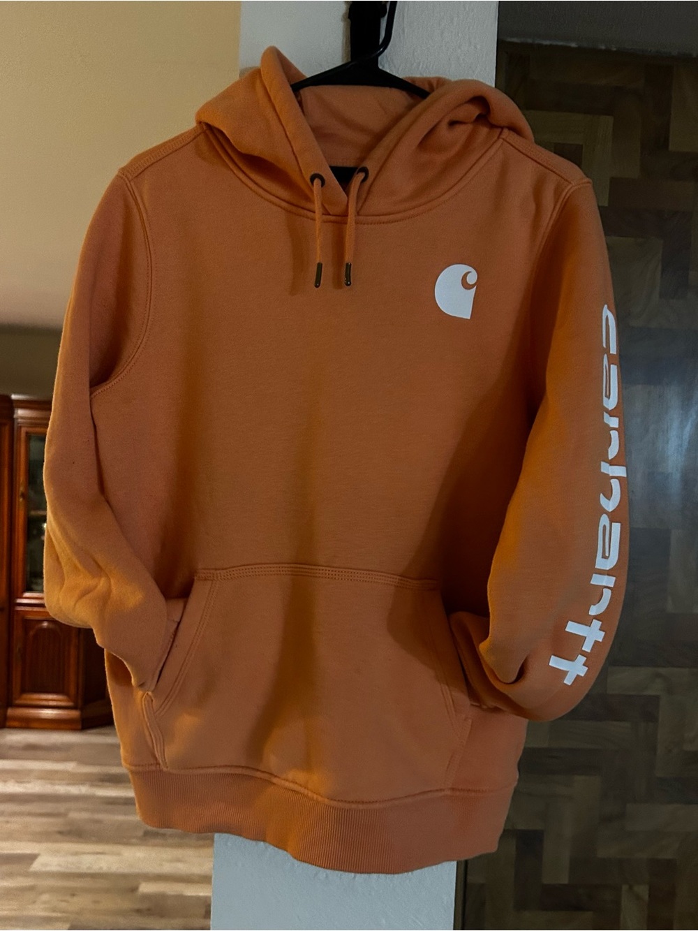 Carhartt Orange Pullover Hoodie with White Logo and Sleeve Script